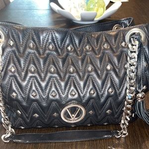 Authentic black Valentino bag with Silver hold  hardware. Used once in great bag